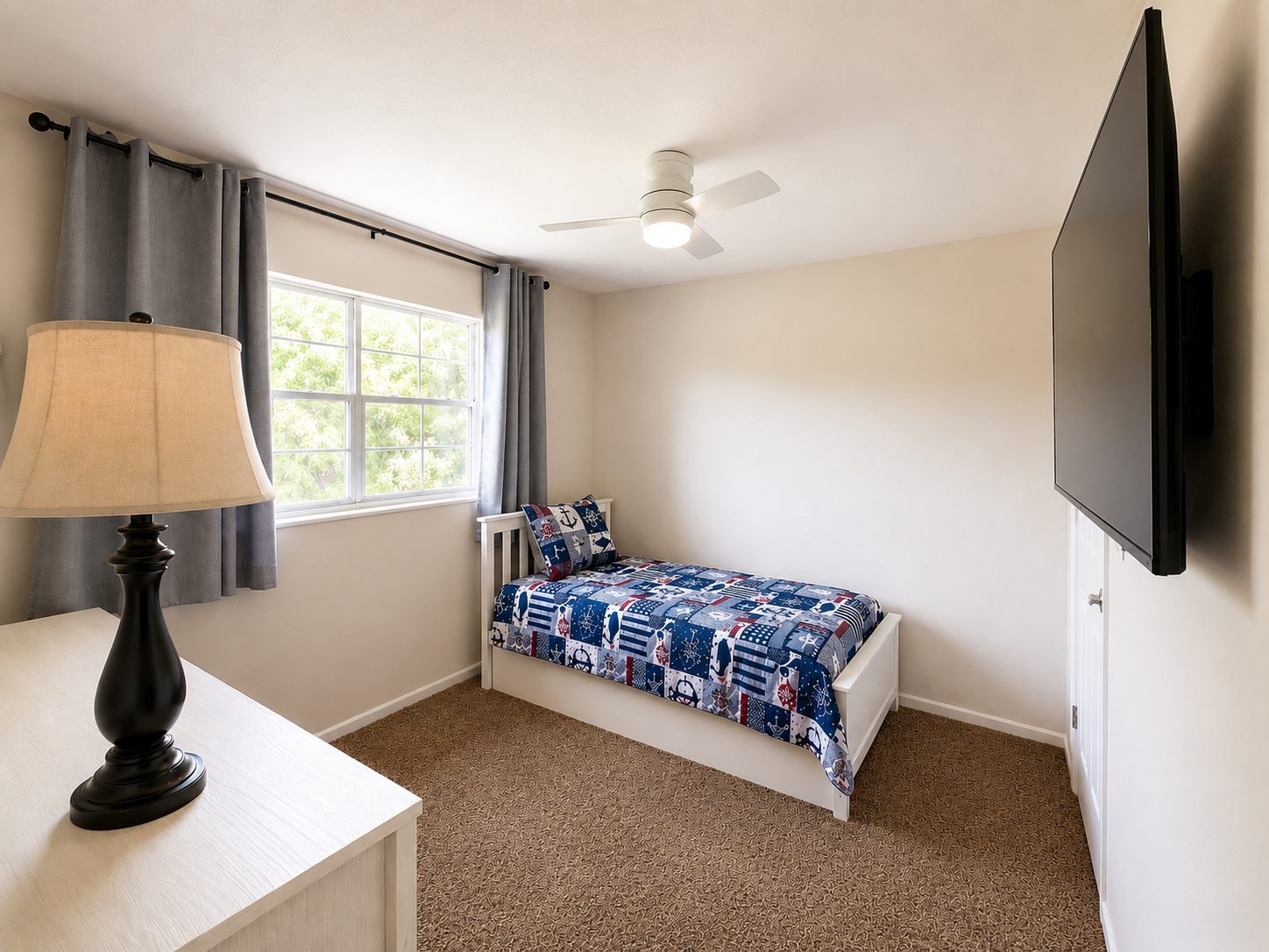 Second bedroom with twin bed and pull-out trundle