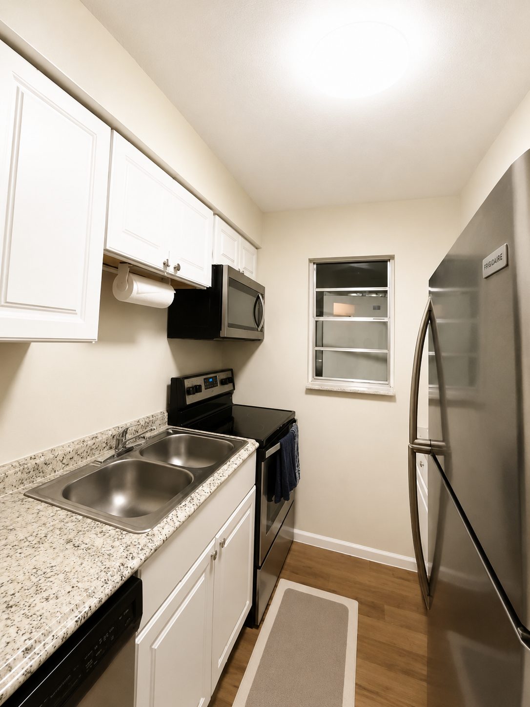 Full kitchen with stainless steel appliances