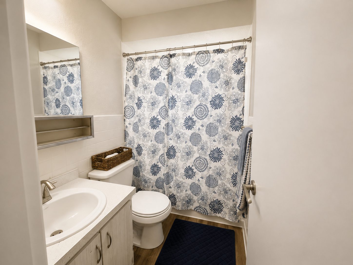 Guest bathroom with tub and shower combination